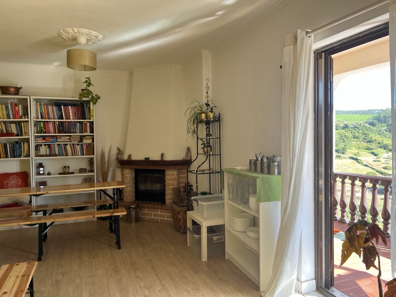 Communal living and dining room with fireplace